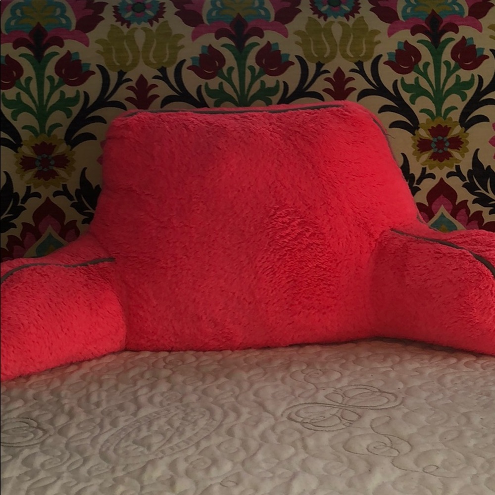 Fuzzy pink armrest pillow